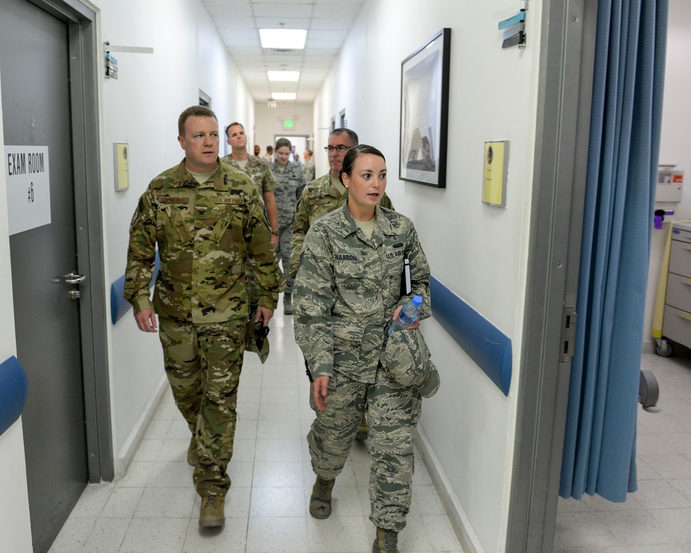 Leadership of the 379th Air Expeditionary Wing get a first-hand look at the base clinic and a 911 emergency response exercise