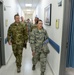 Leadership of the 379th Air Expeditionary Wing get a first-hand look at the base clinic and a 911 emergency response exercise