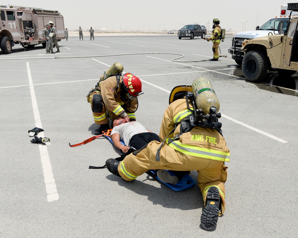 Leadership of the 379th Air Expeditionary Wing get a first-hand look at the base clinic and a 911 emergency response exercise