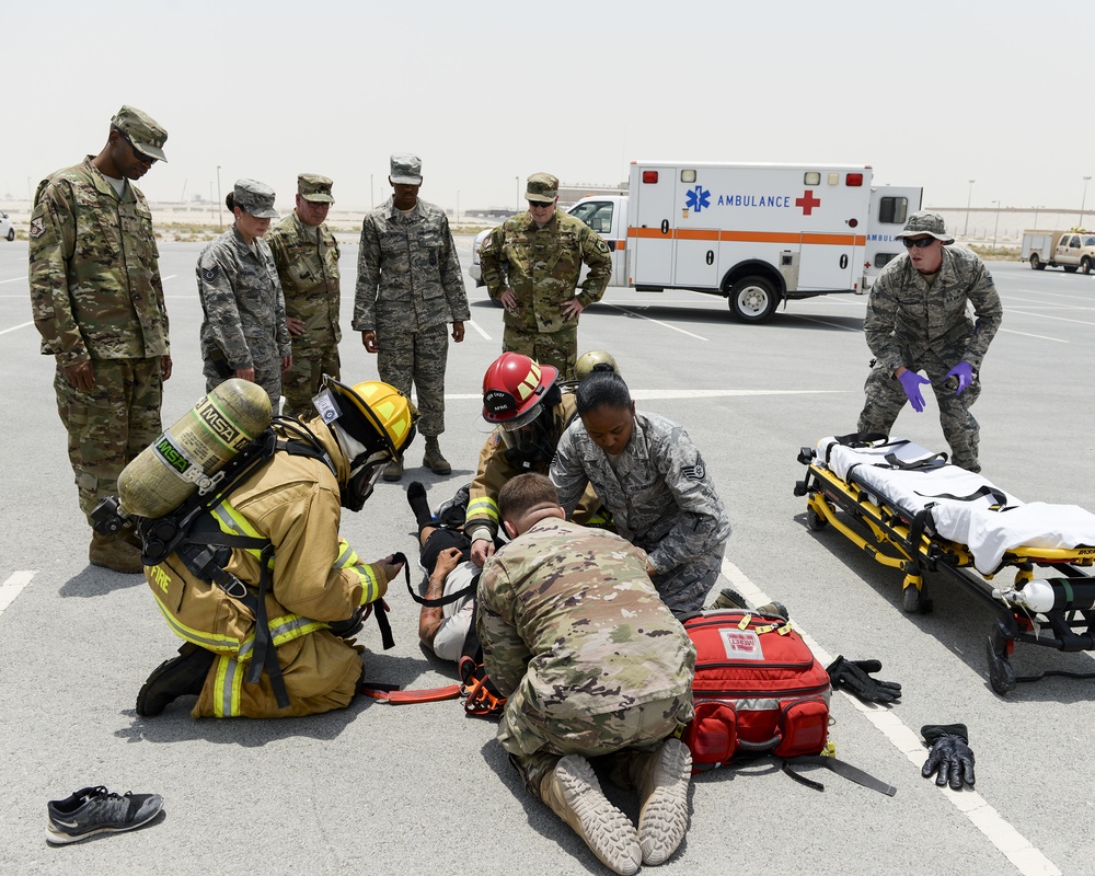 Leadership of the 379th Air Expeditionary Wing get a first-hand look at the base clinic and a 911 emergency response exercise