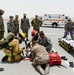 Leadership of the 379th Air Expeditionary Wing get a first-hand look at the base clinic and a 911 emergency response exercise