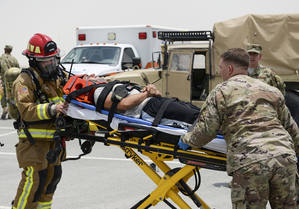 Leadership of the 379th Air Expeditionary Wing get a first-hand look at the base clinic and a 911 emergency response exercise