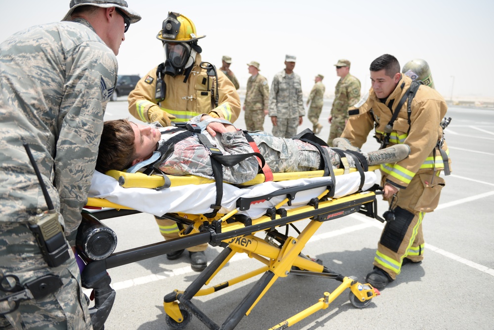 Leadership of the 379th Air Expeditionary Wing get a first-hand look at the base clinic and a 911 emergency response exercise