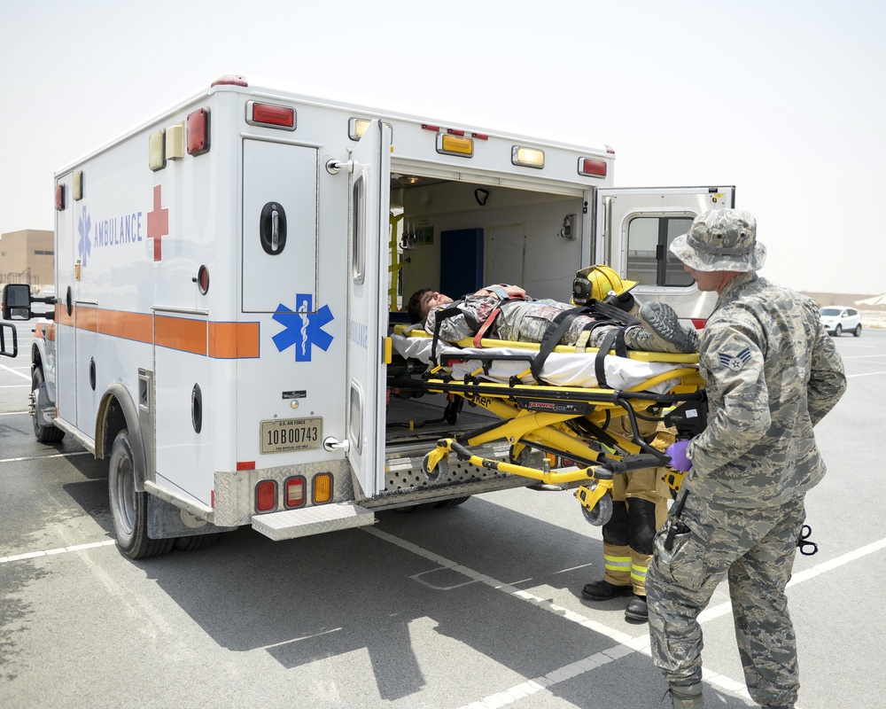 Leadership of the 379th Air Expeditionary Wing get a first-hand look at the base clinic and a 911 emergency response exercise