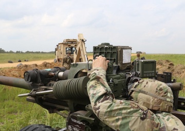 Paratroopers prepare Howitzer artillery