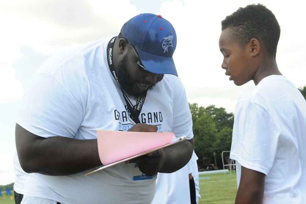 NFL player hosts military youth football camp