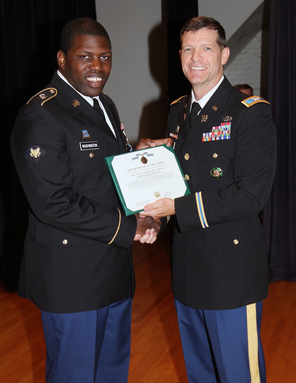 Spc. Washington, 781st MI Battalion, was the TQDC distinguished honor graduate