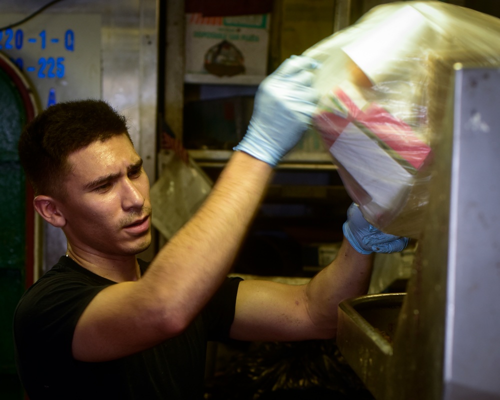 Sailor Works In Trash Room