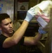 Sailor Works In Trash Room
