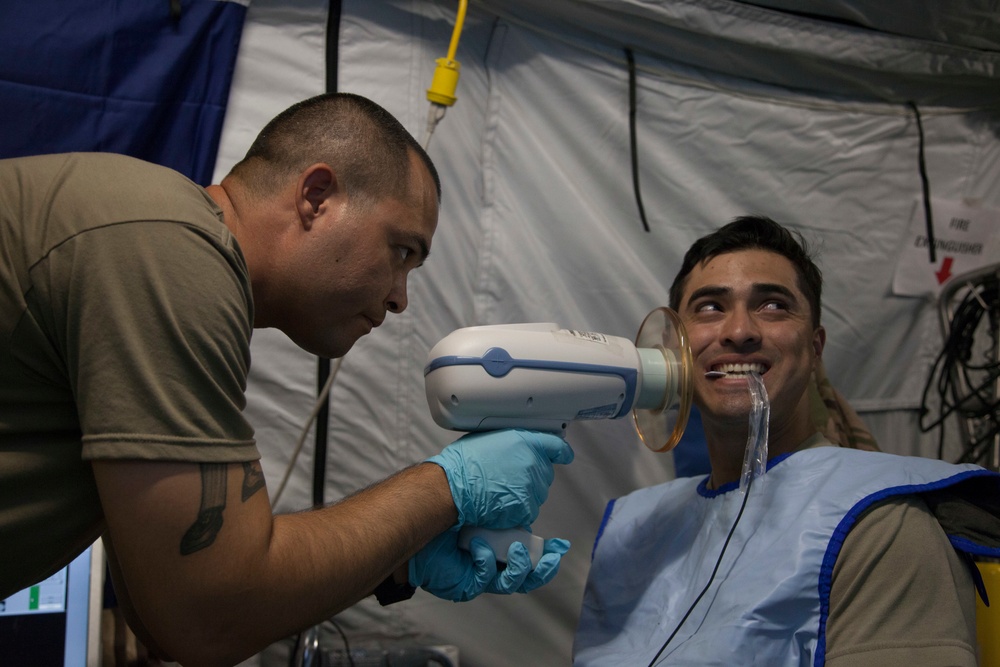 Soldiers Conduct Dental Training