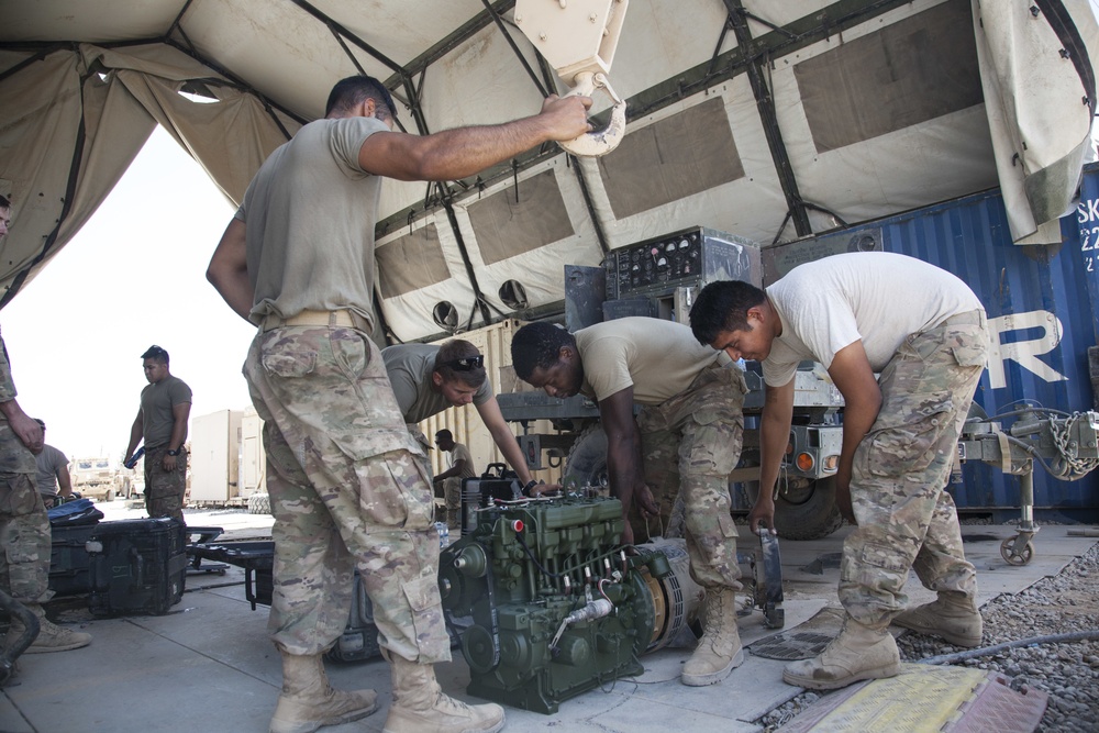 Deployed Paratroopers Conduct Maintenance in Motor Pool