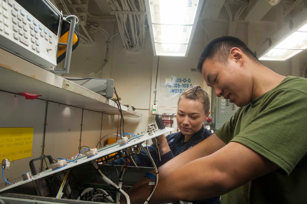 Sailor and Marine conducts maintenance