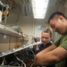 Sailor and Marine conducts maintenance