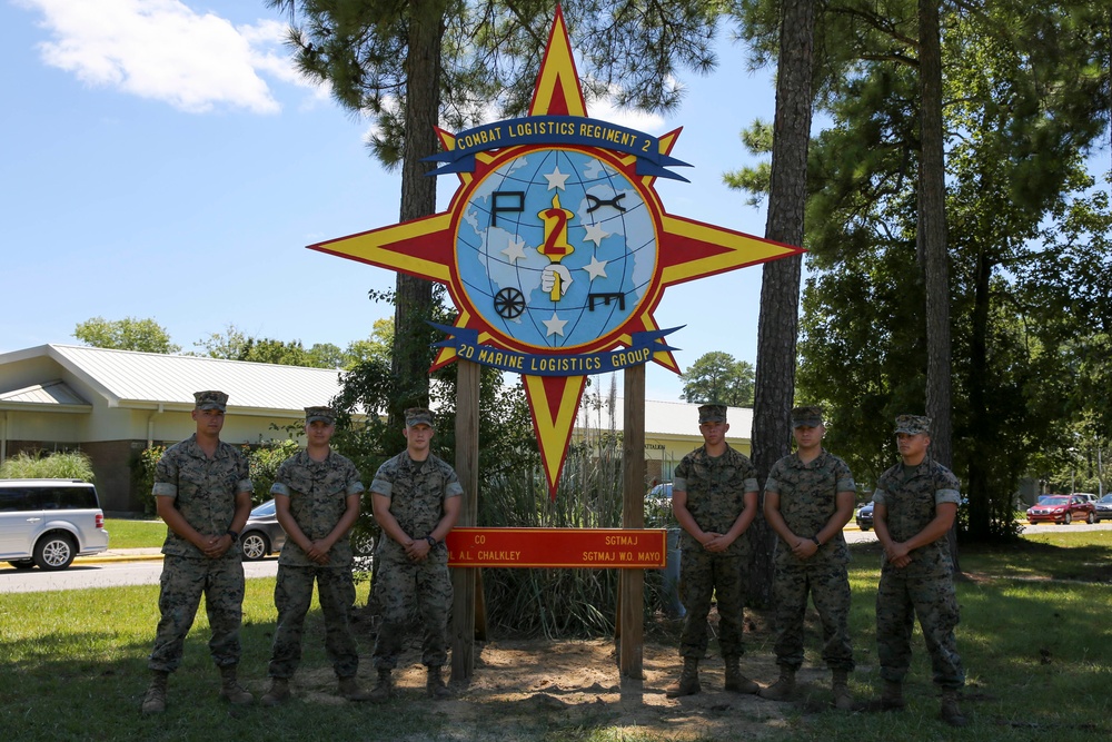 Engineers with CLB-8 present the Regimental CO with a new sign
