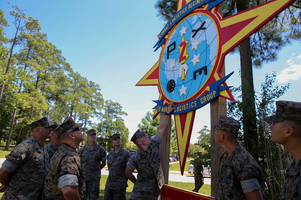 Engineers with CLB-8 present the Regimental CO with a new sign