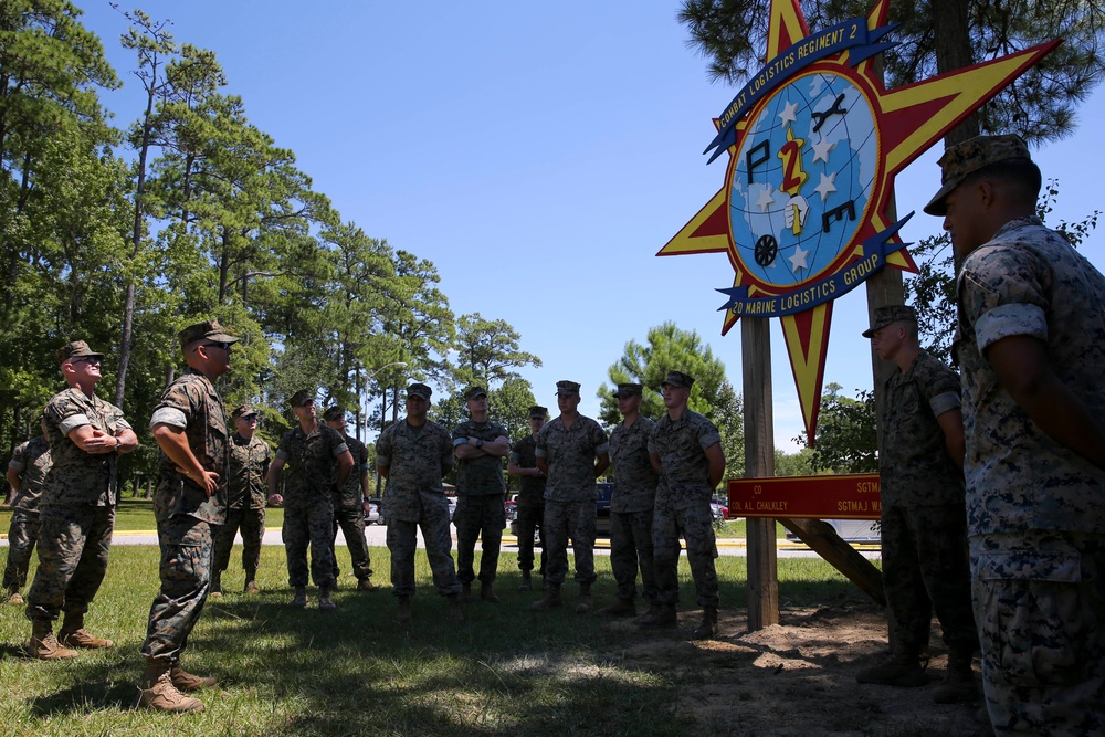 Engineers with CLB-8 present the Regimental CO with a new sign