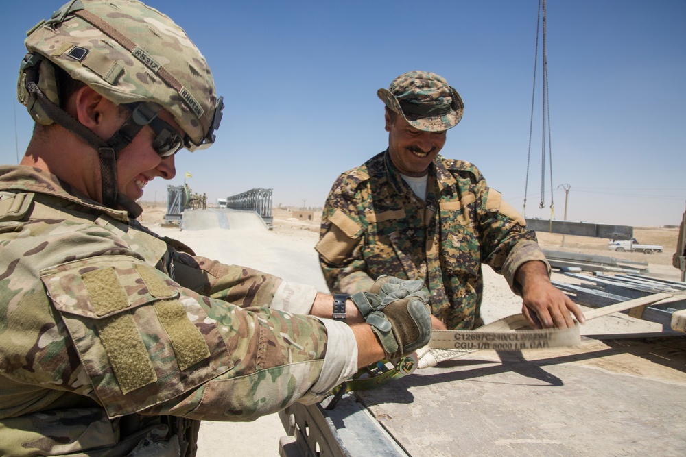 U.S. Army Engineers maintain hasty bridge