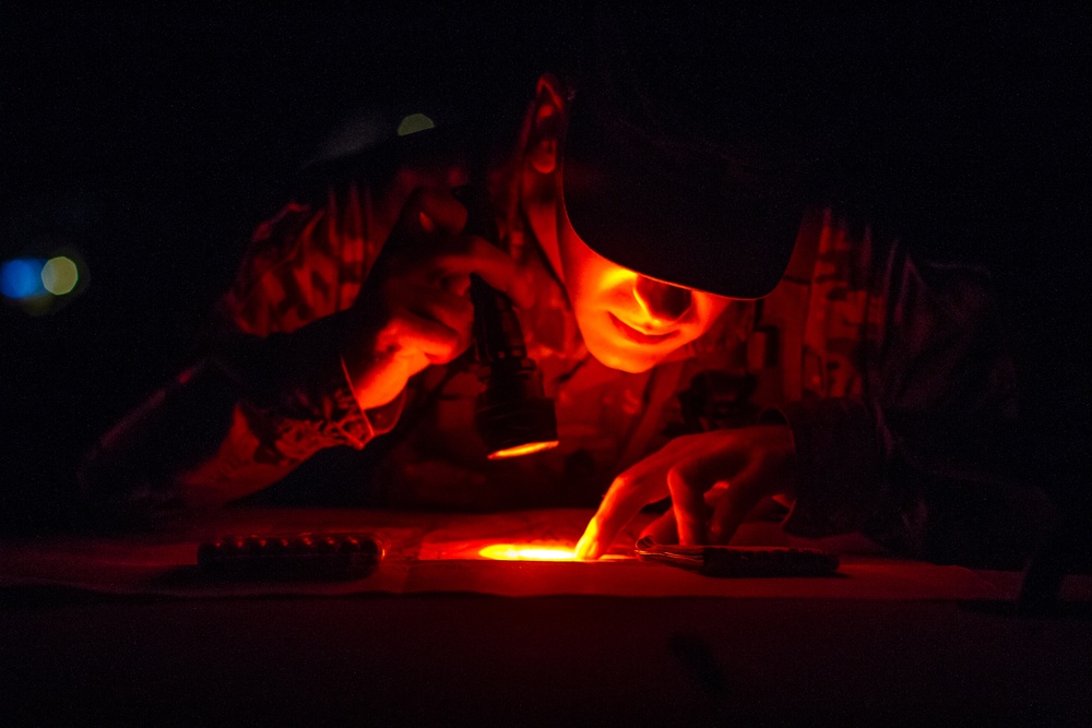 Staff Sgt. Jonathan Anderson plots points