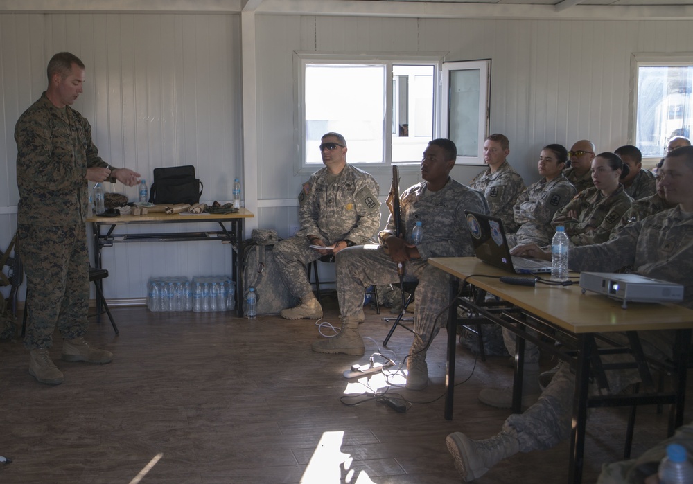 U.S. Navy Corpsmen, Alaska Army National Guard and Mongolian Armed Forces Medics instruct a class on Tactical Combat Casualty Care during Exercise Khaan Quest 2017
