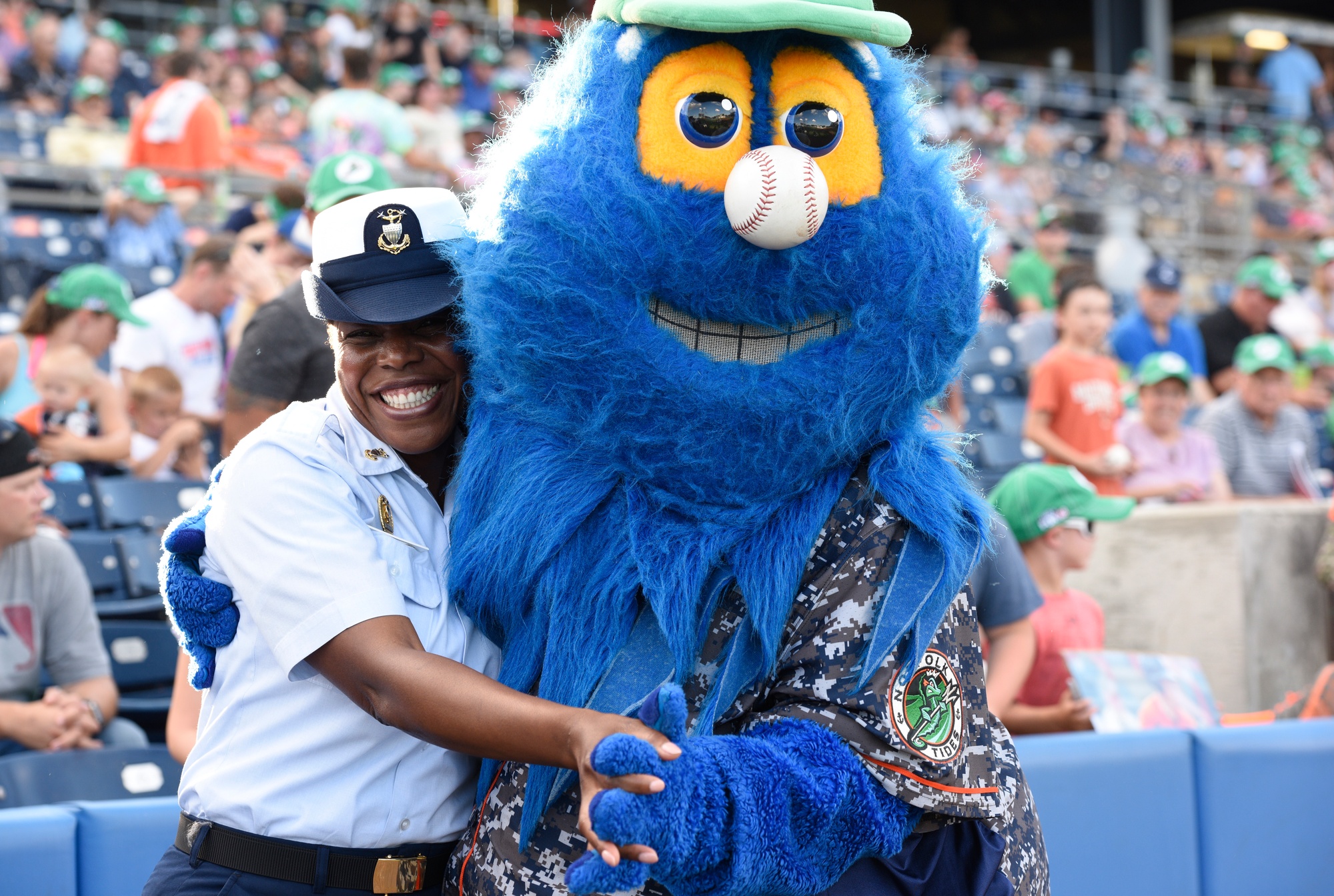 Blue Wahoos mascot Kazoo celebrates Armed Forces Day at VA Clinic