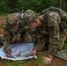 Cpl. Carlo Deldonno and Staff Sgt. Jonathan  Anderson plan their course of attack