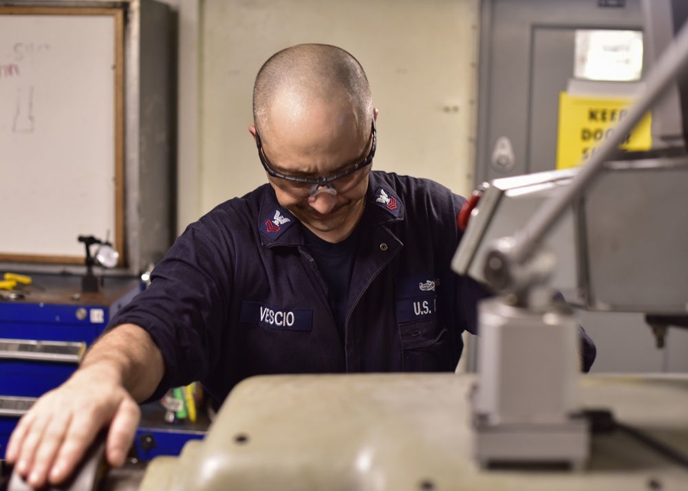 Sailor Uses Lathe Machine