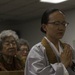 Buddhist Chaplain prays before commission