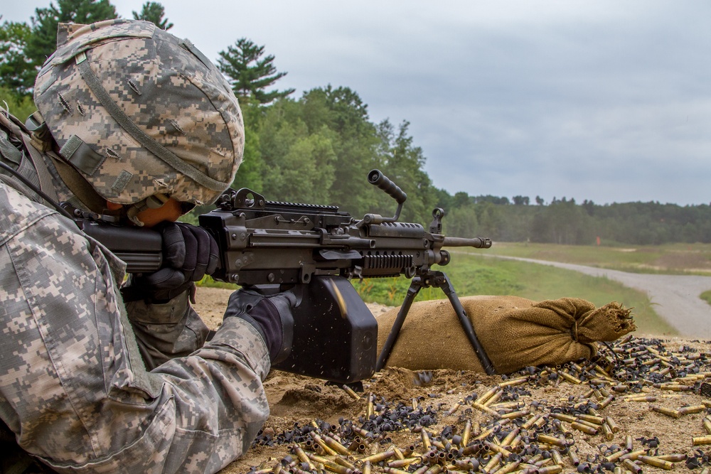 Spc. Kenny Ochoa fires a M-249 squad automatic weapon