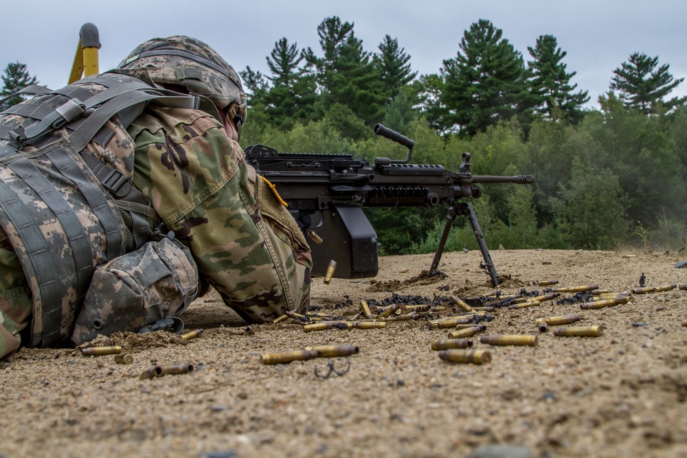 Cpl. Carlo Deldonno fires a M-249 squad automatic weapon