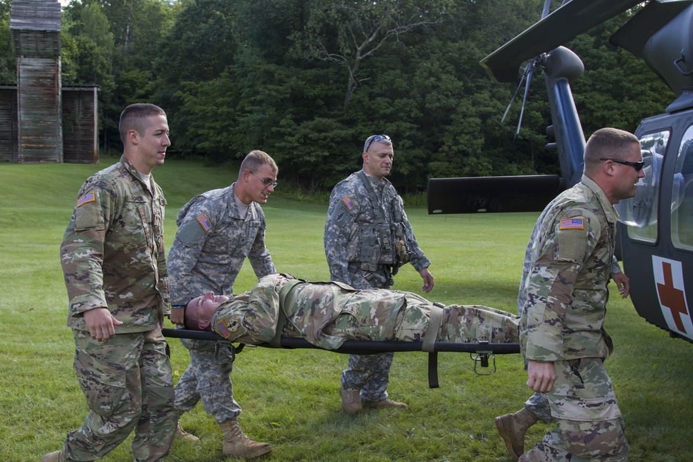 Soldiers Carry Litter to Blackhawk