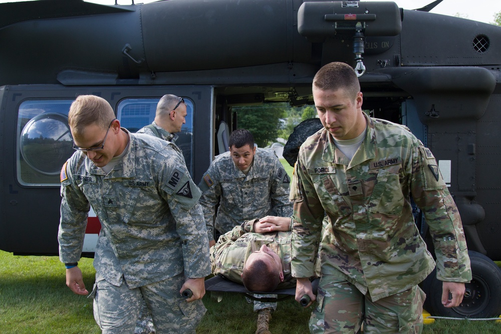 Soldiers Carry Litter from Blackhawk