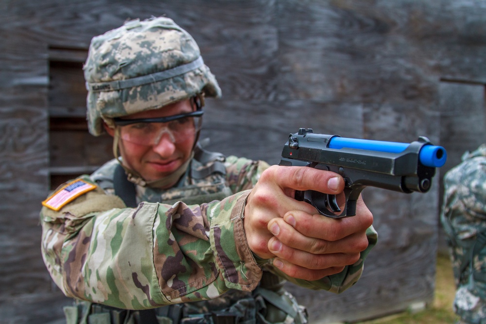 Cpl. Carlo Deldonno practices with a M9 pistol