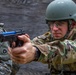 Staff Sgt. Jonathan Anderson practices with a M9 pistol