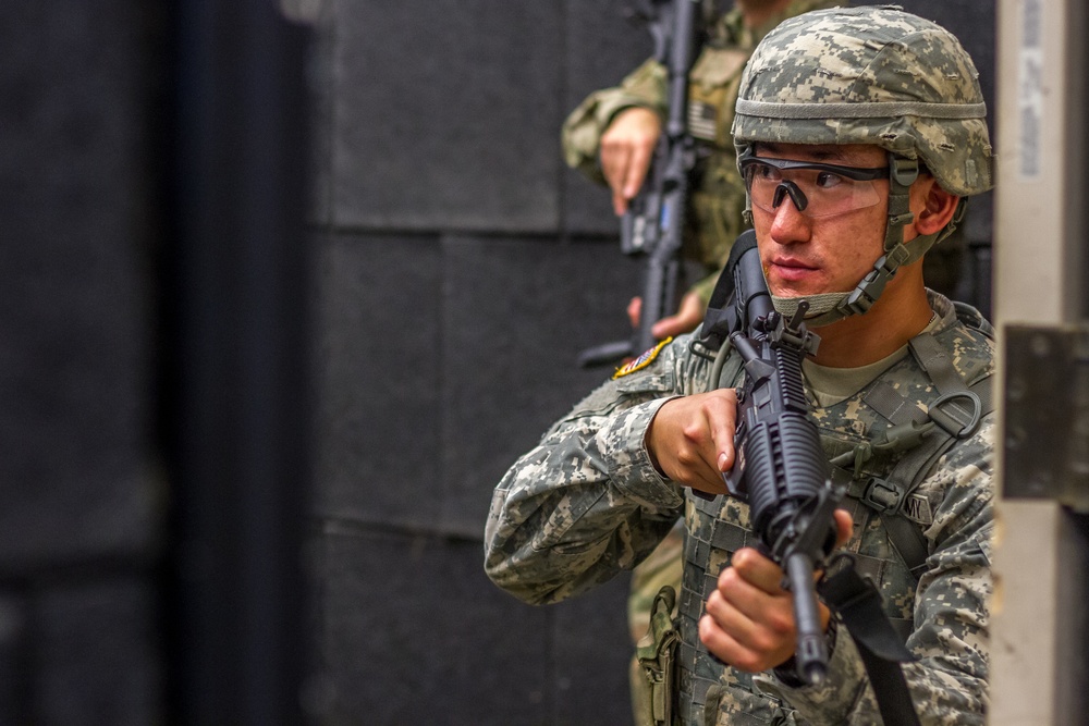 Spc. Wantea Seong prepares to clear a room