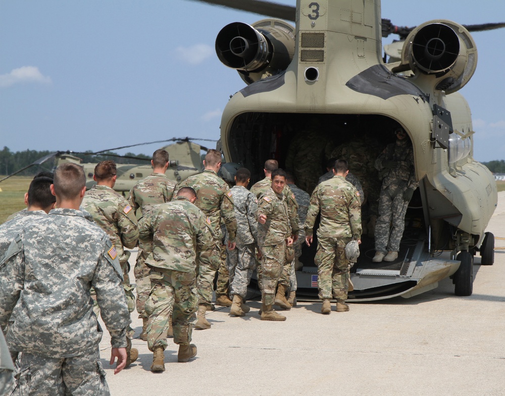 Florida National Guard 3rd Battalion, 265th Air Defense Artillery Regiment, board a CH-47 Chinook