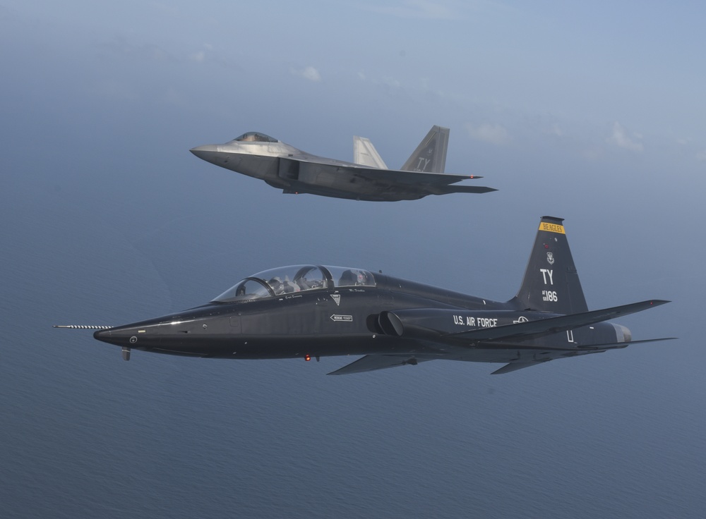 F-22 Raptor and T-38 Talon aerial
