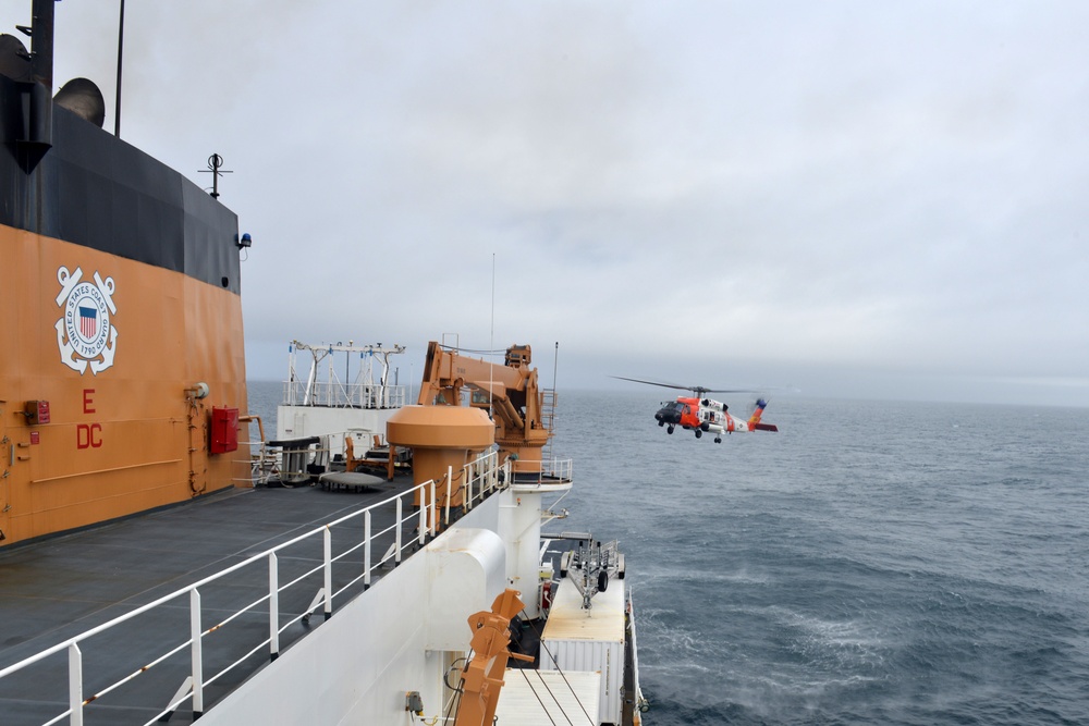 MH-60 Jayhawk helicopter prepares to land on the flight deck of the Coast Guard Cutter Healy