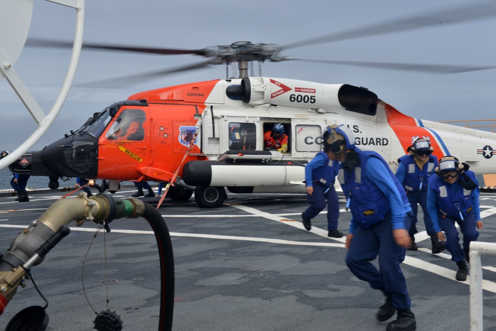 MH-60 Jayhawk helicopter lands on the flight deck of the Coast Guard Cutter Healy