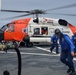 MH-60 Jayhawk helicopter lands on the flight deck of the Coast Guard Cutter Healy