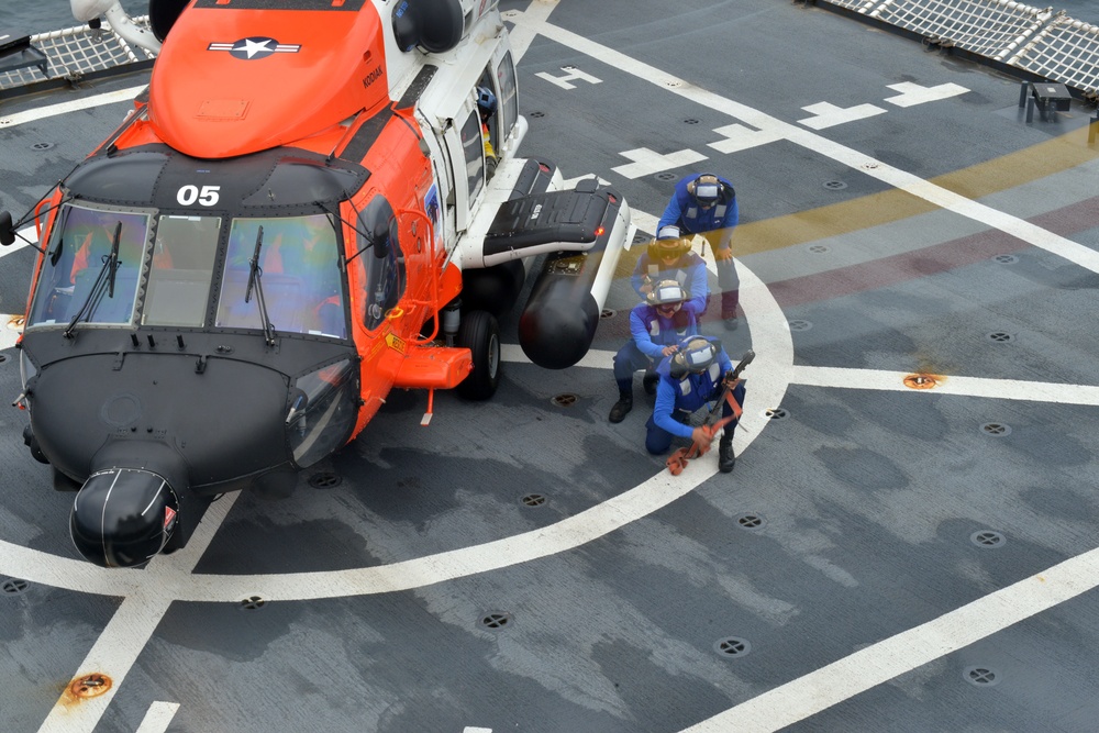 MH-60 Jayhawk helicopter lands on the Coast Guard Cutter Healy