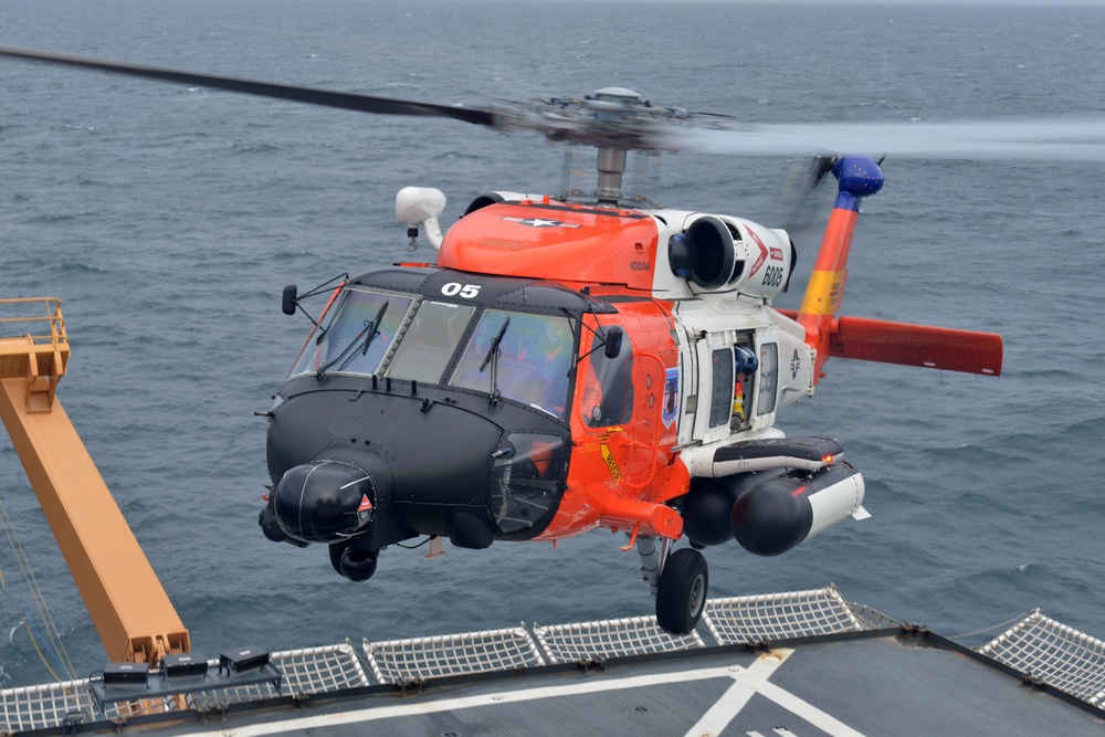 MH-60 Jayhawk helicopter prepares to land on the flight deck of the Coast Guard Cutter Healy