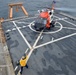 MH-60 Jayhawk helicopter air crew conducts “touch and go” landing and takeoff training operation with the Coast Guard Cutter Healy crewmembers