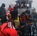 A joint Coast Guard-Navy dive team prepare for an Arctic dive