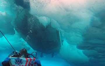 Joint Coast Guard-Navy dive team conduct cold water ice dives in the Arctic