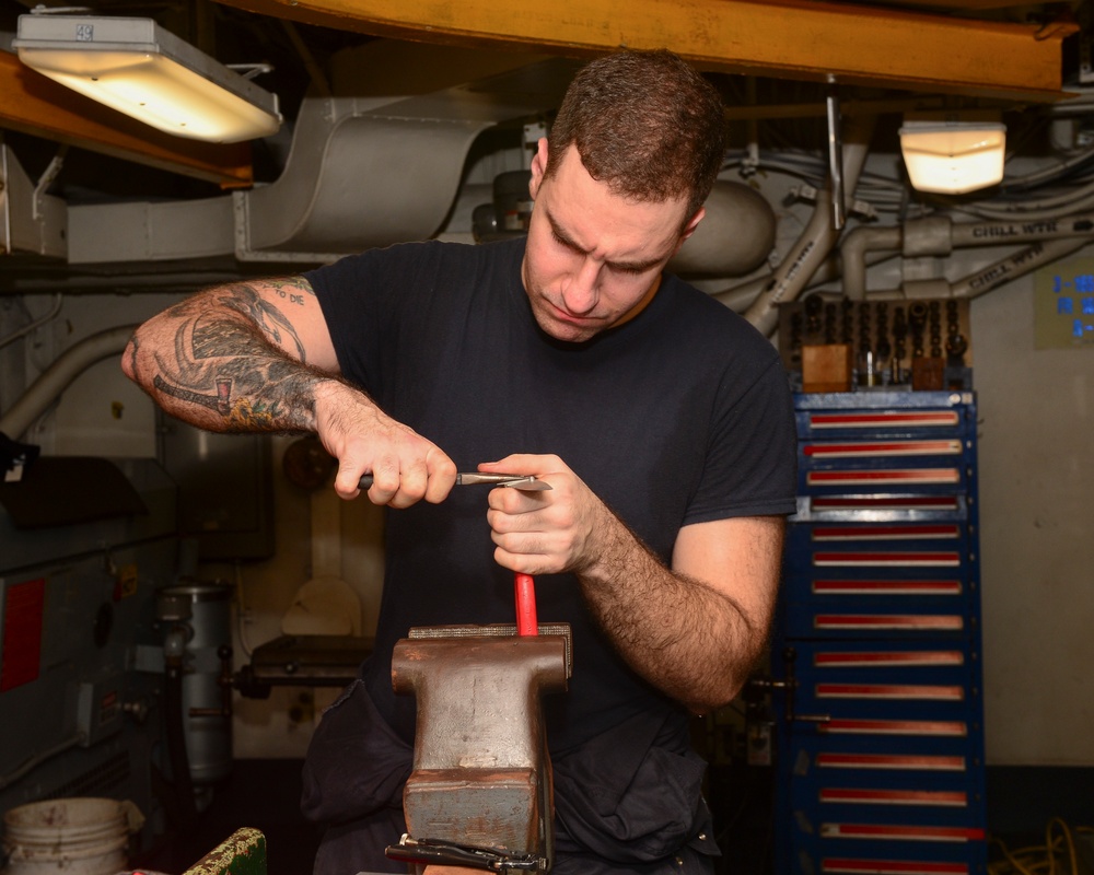 Sailor Repairs Knife