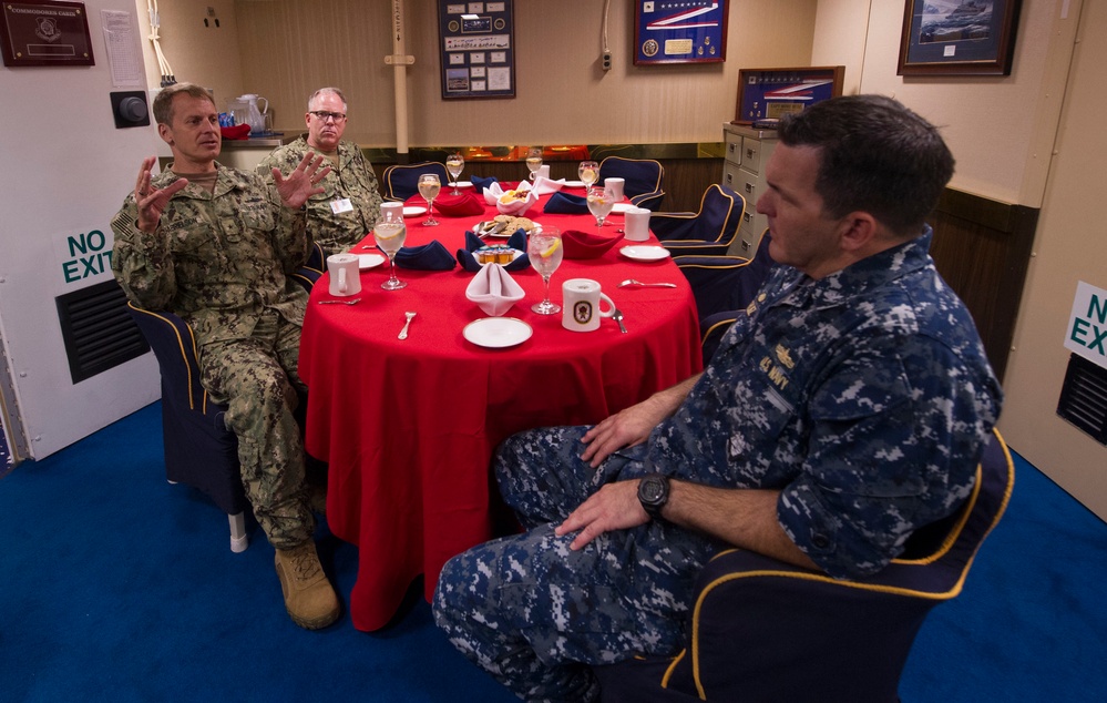 USS America Sailor speaks with admiral
