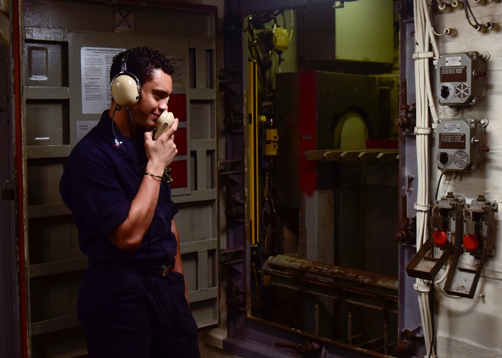 Sailor Operates Elevator