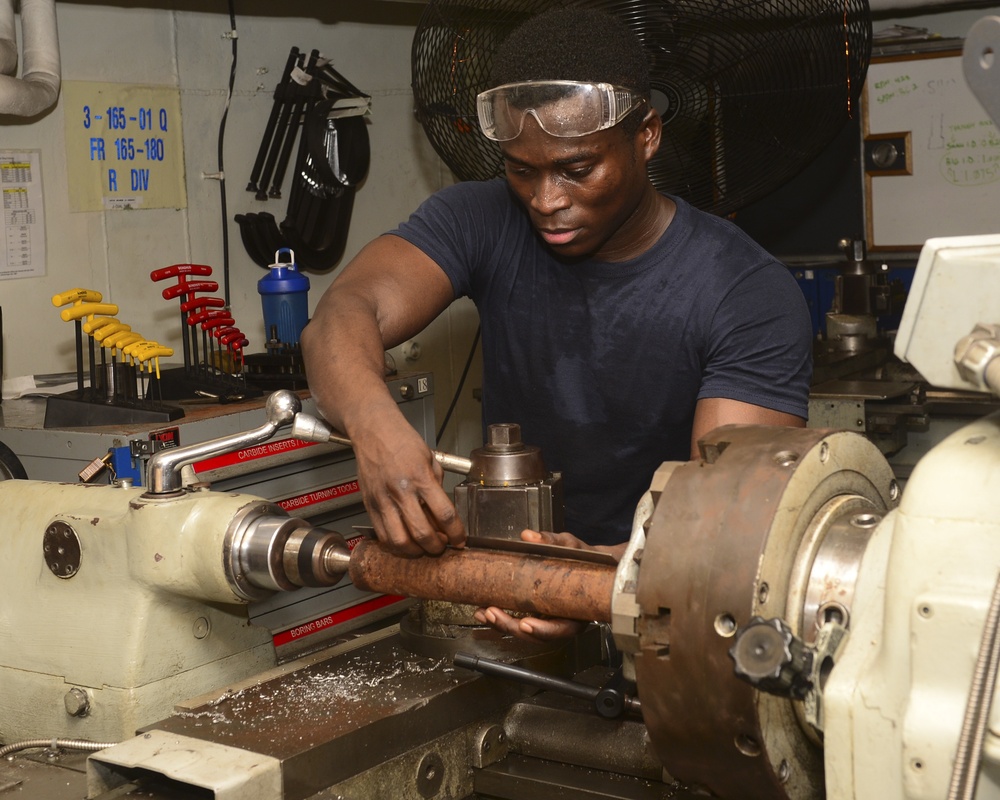 Sailor Measures Pipe