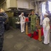 USS America Sailors greets Singaporean Officer