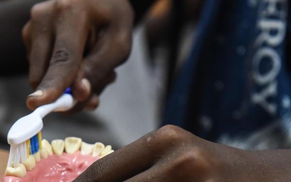 CJTF-HOA Civil Affairs team teaches local children oral hygiene, preventative care